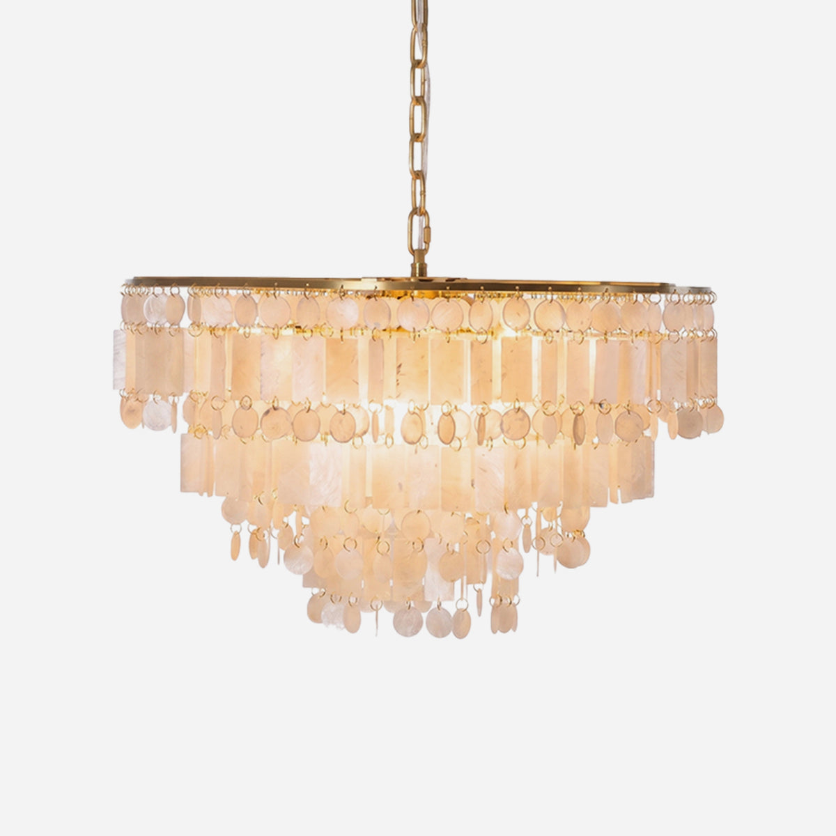 Thalassa Tiered Capiz Shell Chandelier | Capiz Shell, Metal | Fully illuminated multi-tiered coastal chandelier featuring cascading rectangular shell panels mixed with round discs on a polished brass frame | Isolated lit product shot on white background | Severn Lighting