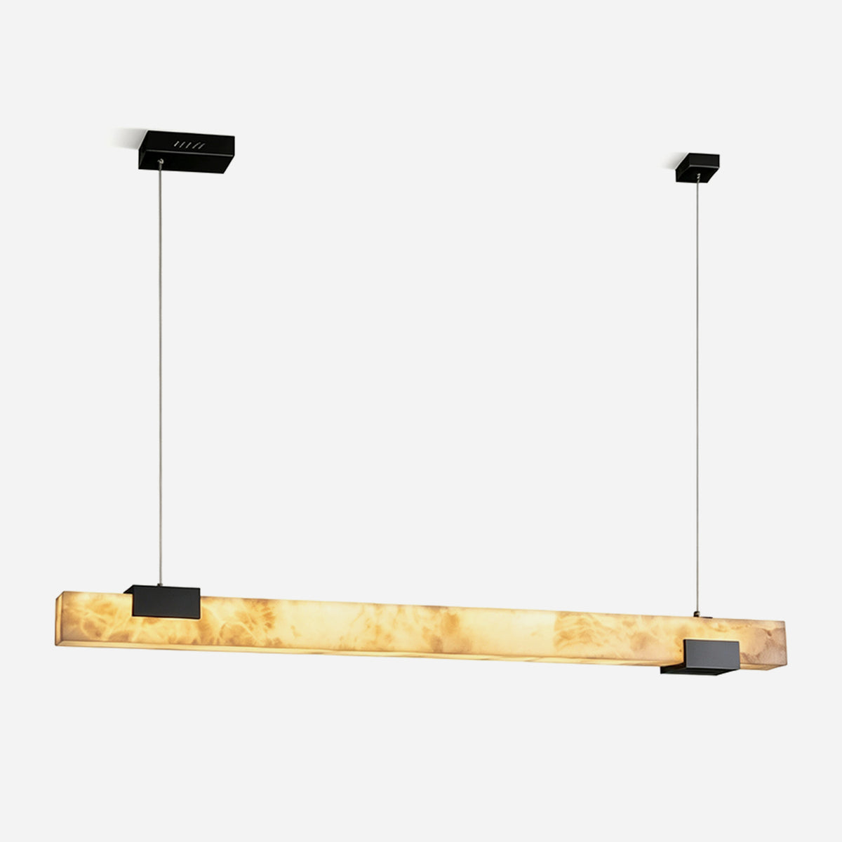 Vale Alabaster Linear Glow Pendant Lighting | Natural Alabaster and Black Metal | Full studio front view isolated on a white background showing the lit linear alabaster shade with black brackets | Severn Lighting
