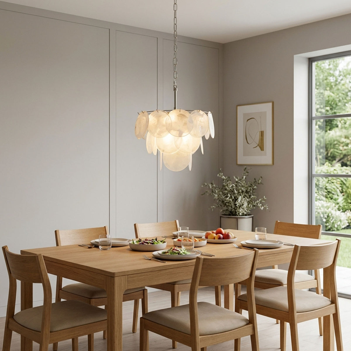 Vaucelle Swirled Glass Disc Tiered Chandelier | Swirled Glass and Brass | Illuminating a modern dining room above a wooden dining set | Severn Lighting