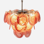 Vaucelle Swirled Glass Disc Tiered Chandelier | Swirled Glass and Brass | Front full view on a pure white background, illuminated | Severn Lighting