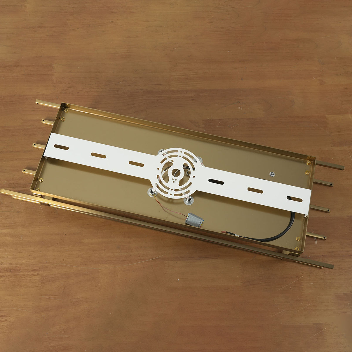 Veraune Bar Wall Sconce | Solid Brushed Brass | Back view showing wall mounting bracket plate and wiring | Severn Lighting