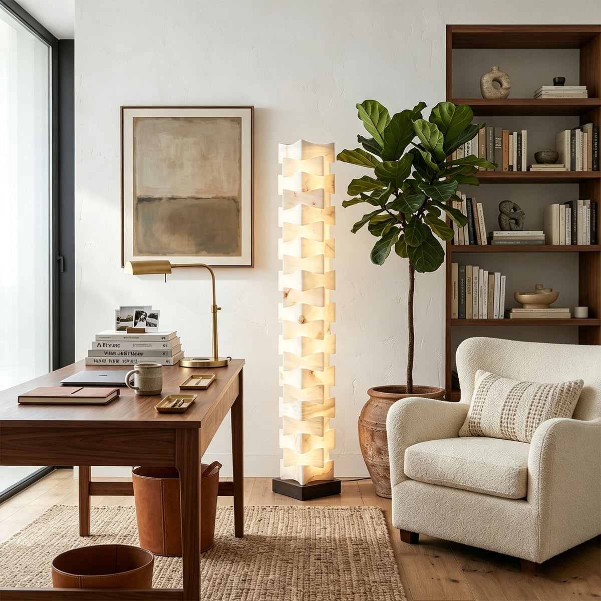 Alden Interlocking Alabaster Column Floor Lamp | Natural Alabaster and Metal | Displayed in a home office near an armchair and bookshelf | Severn Lighting