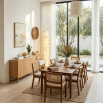 Alden Interlocking Alabaster Column Floor Lamp | Natural Alabaster and Metal | Illuminating a dining room near floor-to-ceiling glass doors | Severn Lighting