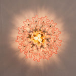 Amabel Dazzling Pink Glass Ceiling Light | Pink Glass and Brass | Bottom-up perspective showing the starburst light pattern on the ceiling | Severn Lighting
