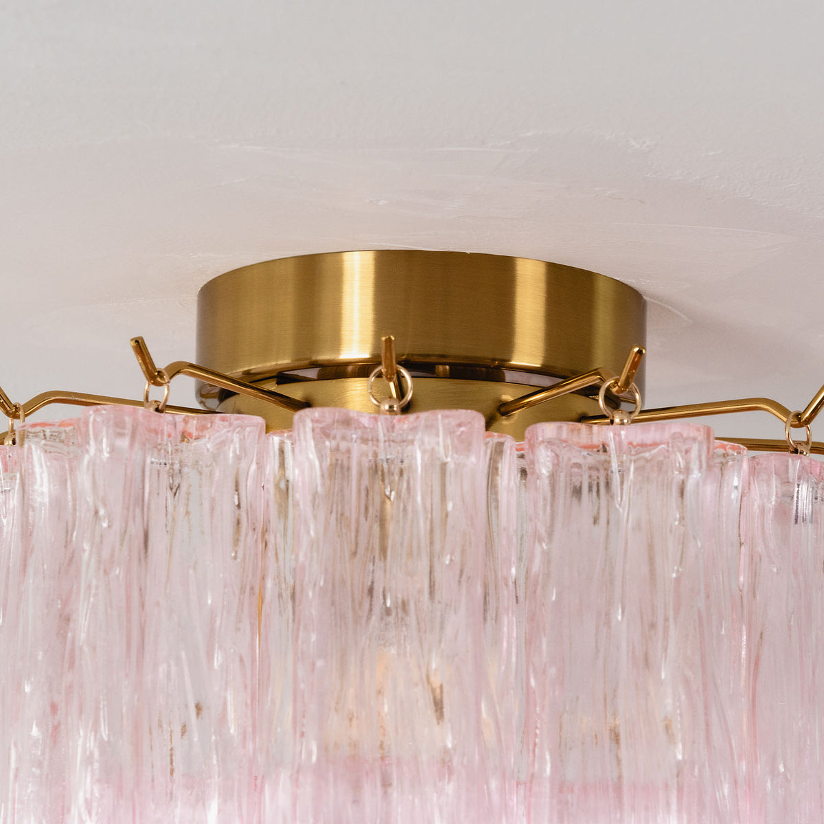 Amabel Dazzling Pink Glass Ceiling Light | Pink Glass and Brass | Close-up detail of the brushed brass flush mount canopy ceiling plate | Severn Lighting
