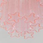 Amabel Dazzling Pink Glass Ceiling Light | Pink Glass and Brass | Detail shot highlighting the star-shaped profile of the pink glass tubes | Severn Lighting