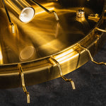 Ambleve Amber Glass Tube Flush Mount Chandelier | Fluted Amber Glass and Brass | Close-up detail of the brushed brass mounting ring with hanging hooks | Severn Lighting