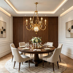 Anders Fluted Glass Urn Brass Chandelier | Fluted Glass and Brass | Displayed in a luxury dining room with wood wall paneling and a round table | Severn Lighting