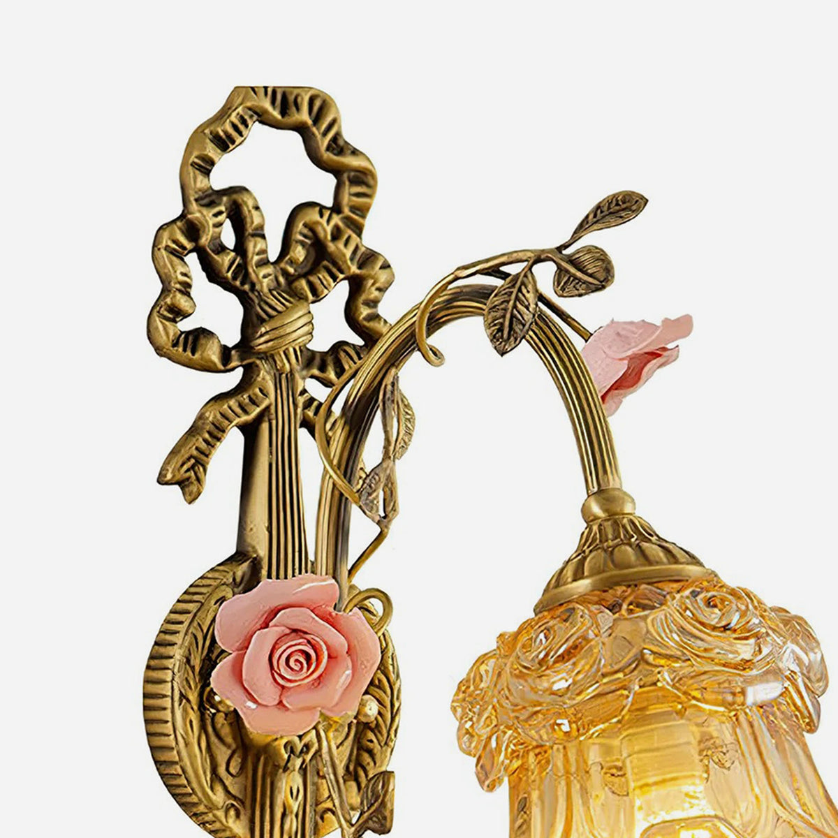 Armelle Rose Glass Brass Wall Lamp | Glass, Ceramic and Brass | Product view showing the pink porcelain rose flower variant | Severn Lighting