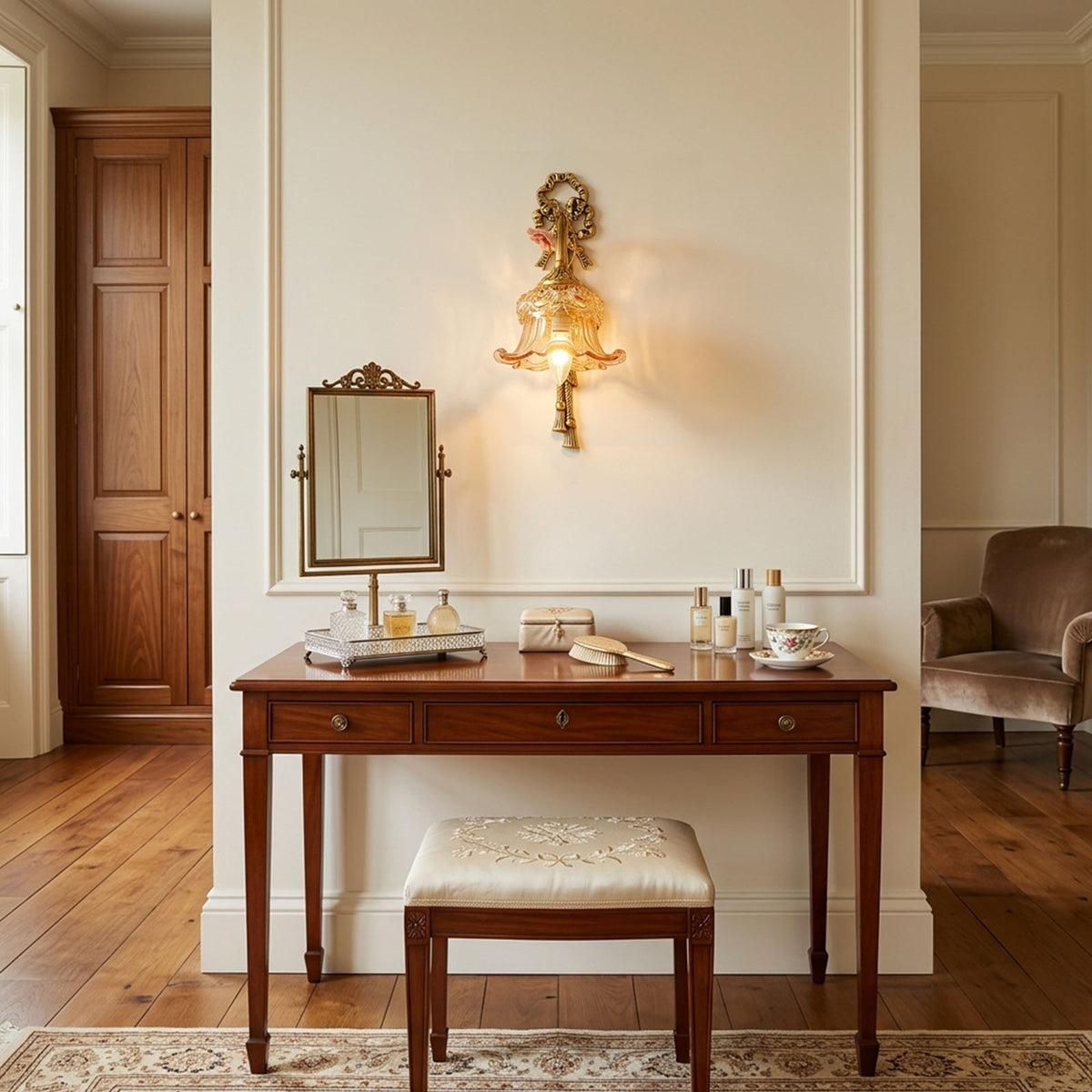 Armelle Rose Glass Brass Wall Lamp | Glass, Ceramic and Brass | Displayed in a dressing room beside a vanity desk and mirror | Severn Lighting