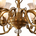 Auberon Ribbed Glass Vine Brass Chandelier | Ribbed Glass and Brass | Close-up view showing the central brass body, vine arms, and bottom ornament | Severn Lighting