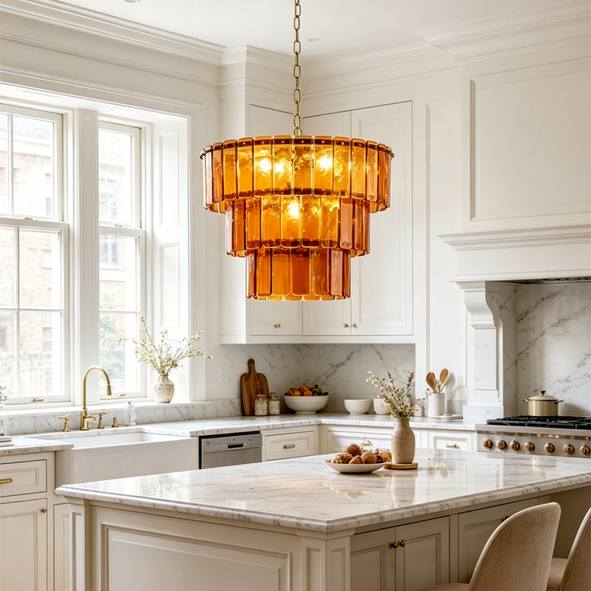 Aurelia Tiered Amber Glass Chandelier | Glass, Metal | Suspended as elegant overhead task lighting above a pristine white kitchen island counter with matching cabinetry | Severn Lighting