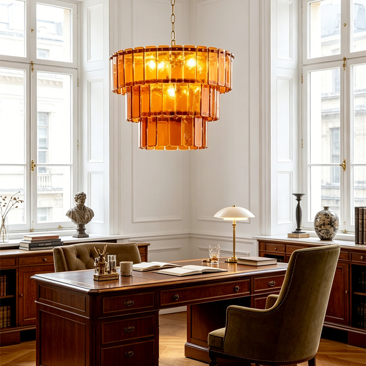 Aurelia Tiered Amber Glass Chandelier | Glass, Metal | Serving as a striking statement fixture in a traditional home library office above a dark wood executive desk and green armchair | Severn Lighting