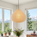 Bryony Teardrop Paper Pendant Light | Washi Paper and Metal | Glowing warmly in a room corner near large windows with a mountain view | Severn Lighting
