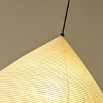 Bryony Teardrop Paper Pendant Light | Washi Paper and Metal | Detail shot focusing on the top section attached to the black cord | Severn Lighting