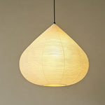 Bryony Teardrop Paper Pendant Light | Washi Paper and Metal | Full hanging view glowing softly against a neutral wall backdrop | Severn Lighting