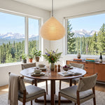 Bryony Teardrop Paper Pendant Light | Washi Paper and Metal | Hanging above a round dining table with a scenic mountain view | Severn Lighting