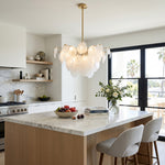 Celestia Art Glass Disc Chandelier | Glass, Metal | Suspended elegantly above a pristine white marble kitchen island counter with matching bar stools in a sunlit kitchen | Severn Lighting