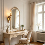 Clemency Winged Figure Brass Sconce | Cast Brass and Glass | Lighting up an elegant white dressing table in a bright room | Severn Lighting