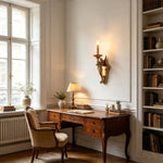 Clemency Winged Figure Brass Sconce | Cast Brass and Glass | Displayed in a traditional home office study near a wooden desk | Severn Lighting