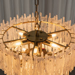Ethereal Icicle Waterfall Chandelier | Frosted Icicle Glass and Gold Brass | Looking up perspective of the illuminated multi-tier fixture highlighting the inner brass frame | Severn Lighting