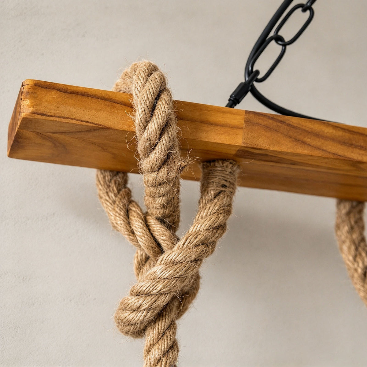 Fermaine Cage Chandelier | Timber and Rope | Detailed view of rope knot on wood beam and metal chain | Severn Lighting