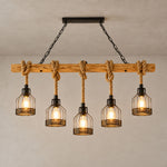 Fermaine Cage Chandelier | Wood, Rope, and Iron | Full 5-light fixture hanging against grey plaster wall | Severn Lighting
