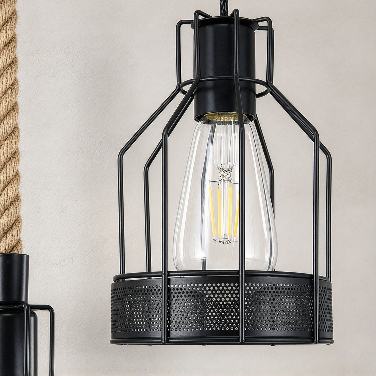Fermaine Cage Chandelier | Iron Wire and Mesh | Macro close-up of single geometric cage shade and bulb | Severn Lighting