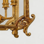 Florian Fretwork Brass Lantern Pendant Light | Glass and Brass | Macro close-up of the carved brass corner scroll foot on a white background | Severn Lighting