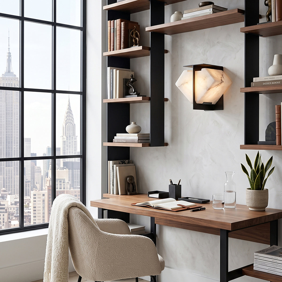 Freya Angular Alabaster Wall Sconce | Office Nook Lighting | Mounted on a wall to illuminate a loft study workspace with industrial open shelving above a wooden writing desk | Severn Lighting