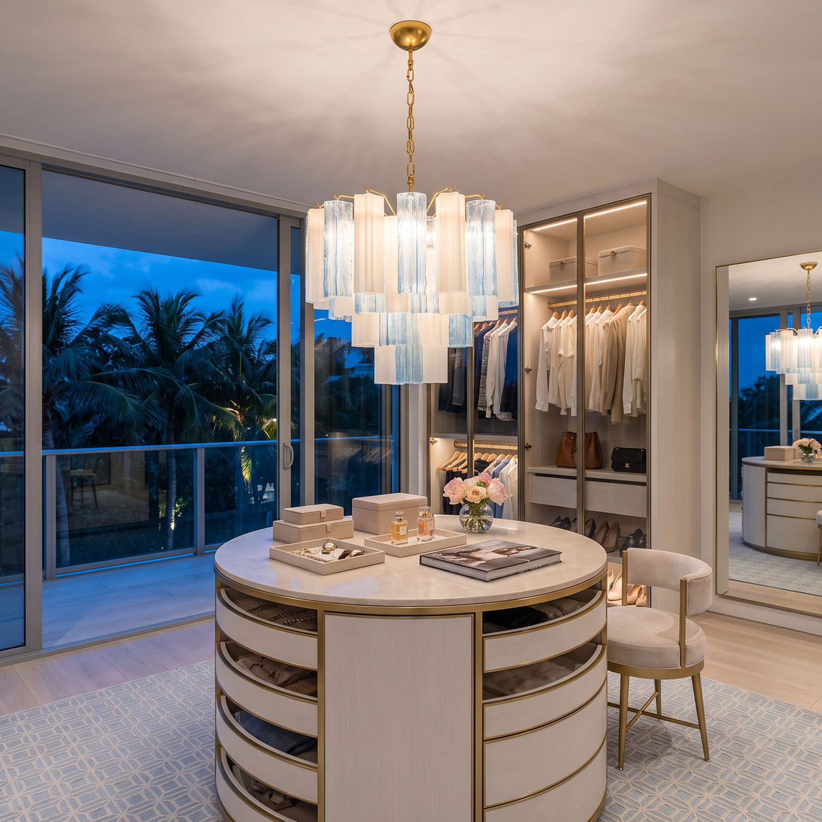 Givrane Two-Tone Glass Tube Tiered Chandelier | Two-Tone Glass and Brass | Suspended in a luxury walk-in closet with a circular island at dusk | Severn Lighting