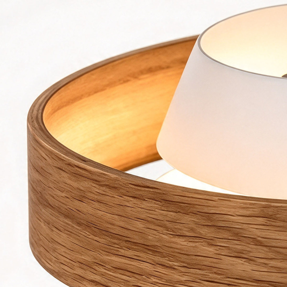 Holmvik Walnut Ring Tiered Metal Pendant Light | Walnut Wood and Metal | Angled close-up detail of the natural wood grain ring and white inner shade | Severn Lighting