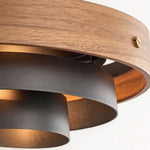 Holmvik Walnut Ring Tiered Metal Pendant Light | Walnut Wood and Metal | Macro shot of the walnut wood band with brass screw rivet and black metal tiers | Severn Lighting