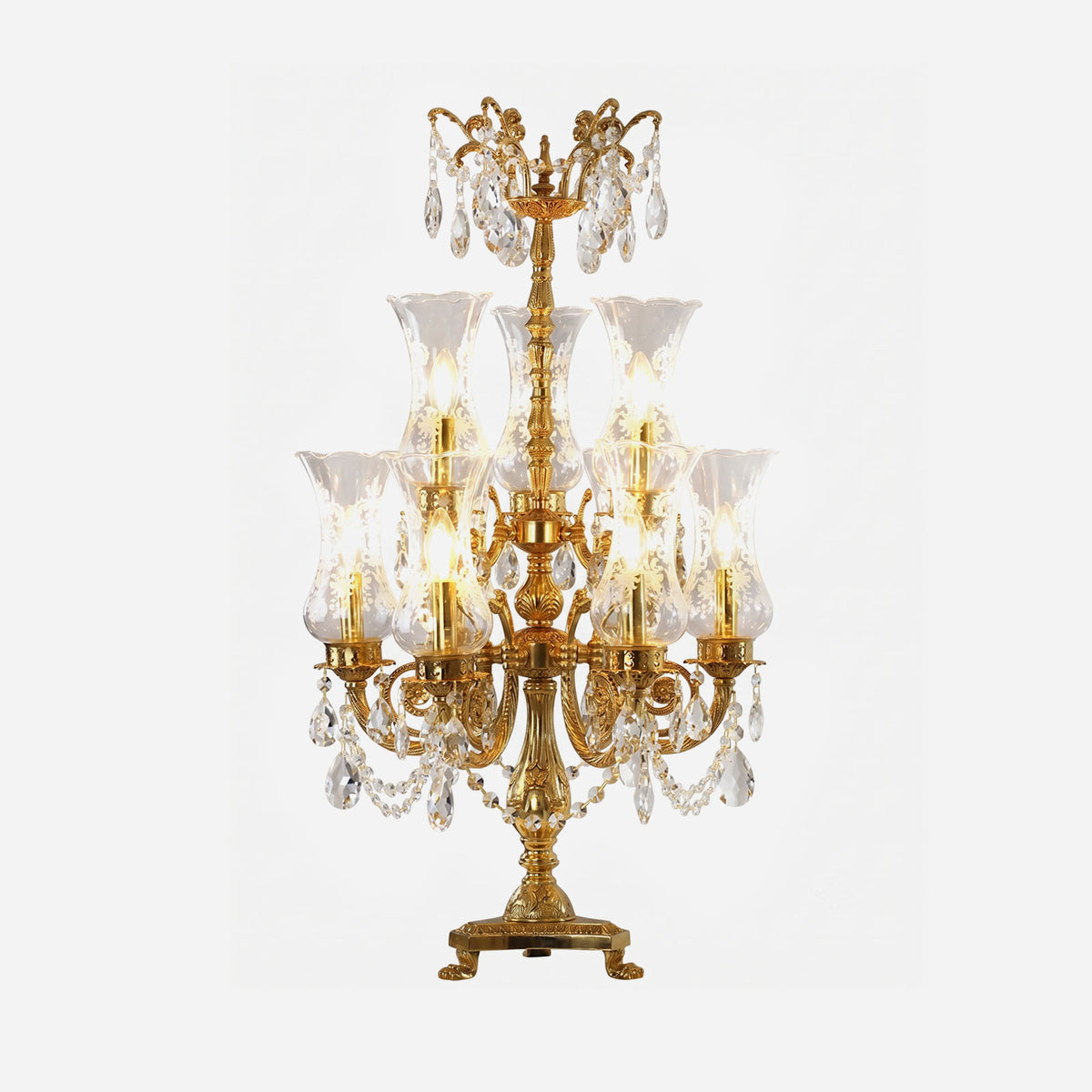 Isambard Candelabra Table Lamp | Cut Crystal and Brass | Front full view on a pure white background, illuminated | Severn Lighting