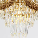 Isambard Crowned Crystal Basket Pendant Light | Cut Crystal and Brass | Close-up view of the illuminated crystal prisms and basket bottom | Severn Lighting