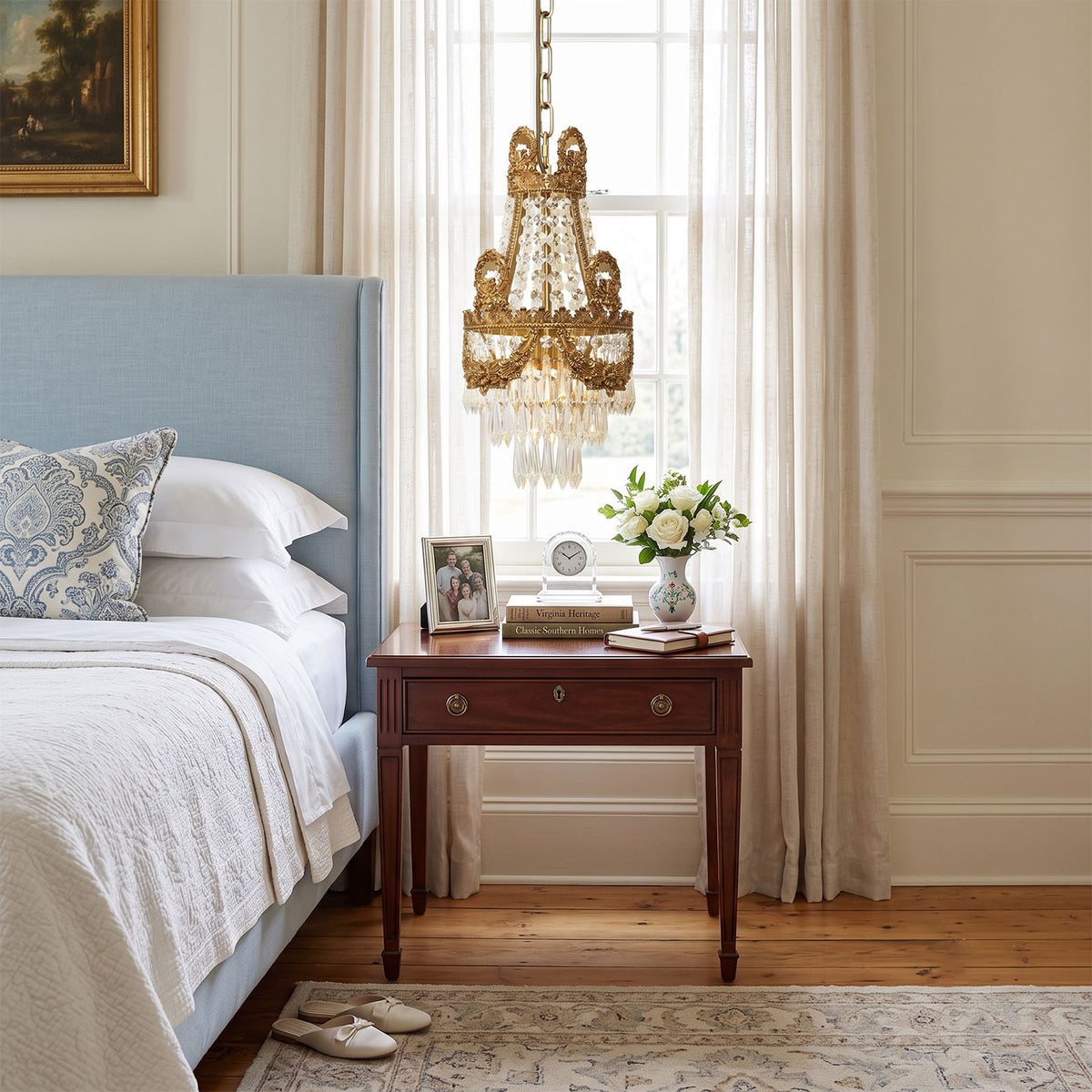 Isambard Crowned Crystal Basket Pendant Light | Cut Crystal and Brass | Hanging beside a blue upholstered bed over a wooden nightstand | Severn Lighting