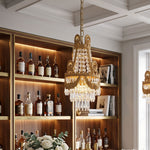 Isambard Crowned Crystal Basket Pendant Light | Cut Crystal and Brass | Illuminating a corner space near a wooden wine display cabinet | Severn Lighting