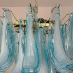 Isar Blue Petal Glass Chandelier | Blue Glass and Brass | Macro close-up shot highlighting the translucent blue glass petal texture | Severn Lighting