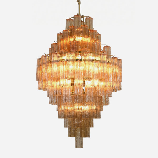 Kester Amber Glass Tier Chandelier | Amber Glass and Brass | Front full view on a pure white background, illuminated | Severn Lighting