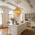 Kester Amber Glass Tier Chandelier | Amber Glass and Brass | Lighting up a white kitchen island area with coffered ceiling | Severn Lighting