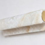 Lamelune Stacked Sconce | Alabaster and Brass | Three-quarter studio view of tiered stone slats, unlit | Severn Lighting