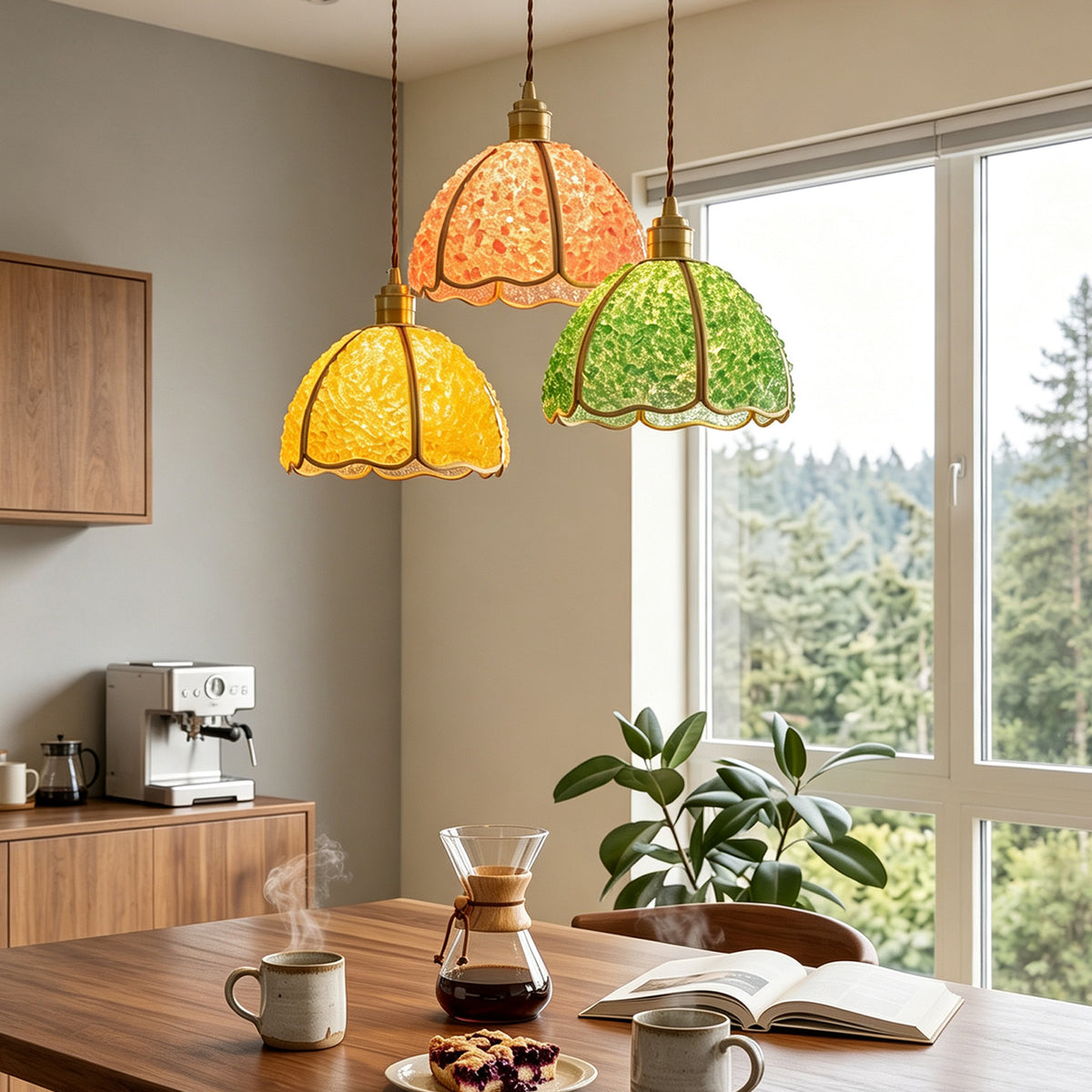 Liora Mosaic Glass Pendant Light | Colored Mosaic Glass and Brass | A set of three pendants in yellow, green, and pink illuminating a dining table in a room with forest views | Severn Lighting