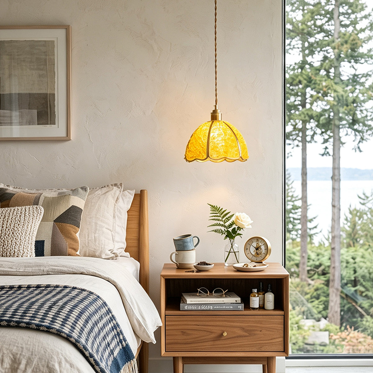 Liora Mosaic Glass Pendant Light | Yellow Mosaic Glass and Brass | Single yellow pendant hanging over a wooden nightstand in a cozy bedroom with scenic window views | Severn Lighting