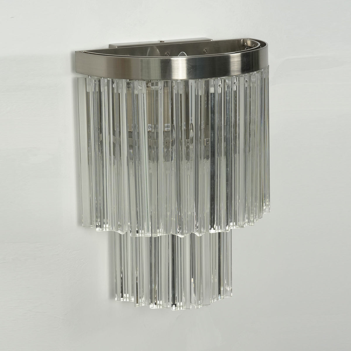 Marelle Glass Rod Tiered Wall Lamp | Clear Glass Rods and Metal | Studio product view unlit displaying the tiered glass rod structure on white backdrop | Severn Lighting