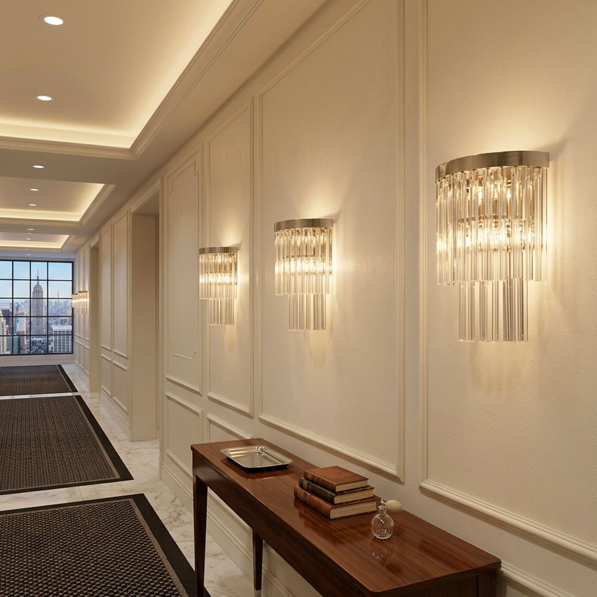 Marelle Glass Rod Tiered Wall Lamp | Clear Glass Rods and Metal | Multiple sconces lined along a long corridor hallway illuminating the passage | Severn Lighting