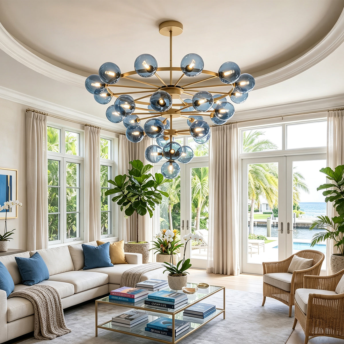 Marisol Aquamarine Glass Bubble Chandelier | Aquamarine Glass and Brass | Illuminating an elegant sitting room with tray ceiling and palm trees view | Severn Lighting