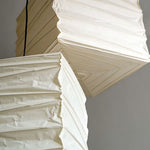 Marlen Squared Paper Column Pendant | Washi Paper and Metal | Low-angle view showing the unlit white paper shade and folded texture | Severn Lighting