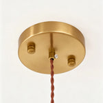 Marlowe Speckled Glass Pendant Lamp | Colorful Speckled Glass and Brass | Close-up macro detail showing the round brushed brass ceiling canopy and twisted fabric cord | Severn Lighting