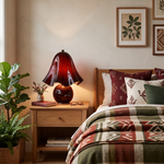 Mouchelle Mushroom Lamp | Red Glass and Brass | Bedside accent lamp in a cozy cottage bedroom with plaid | Severn Lighting