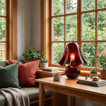 Mouchelle Mushroom Lamp | Red Glass and Brass | Styled on a window nook coffee table facing garden view | Severn Lighting